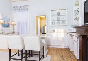 Charming apartment with 12 foot ceilings, fireplaces, and lots of sunshine.