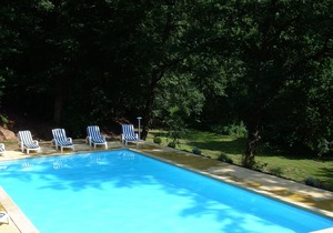 In the nature, along the river with sport activities and swimming pool