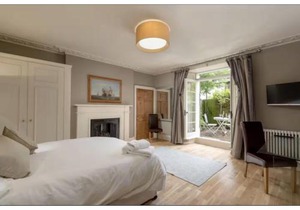 JOIVY Boutique Apt with Patio in New Town