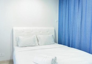 Modern Living 1BR @Atlanta Residences Apartment With City View By Travelio