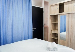 Modern Living 1BR @Atlanta Residences Apartment With City View By Travelio