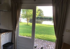 Spend the night on the water in Tiny House/Trekkershut Comfort/Mini Bungalow