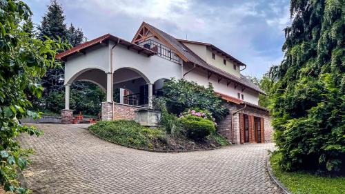 Olmod House | Őzkút Apartmanház