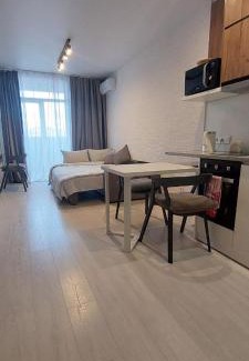 Shevchenkivs'kyi District Apartment | Затишна, стильна студія біля Виставкового центру
