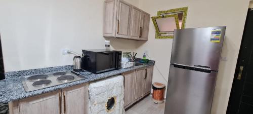 Al-Hammam Apartment | شالية ارضي بحديقة في اكوا فيو