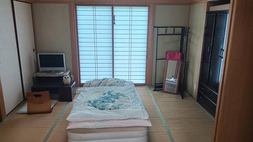 Maniwa House | 坂本邸