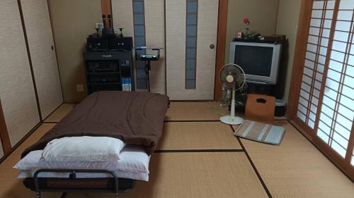 Maniwa House | 坂本邸