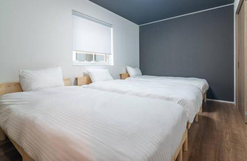 Toyohira Villa | 新屋 札幌市中心薄野車程5分鐘 挑高設計客廳 可停車1台 高速Wi Fi 地鐵徒步5分 一站到薄野