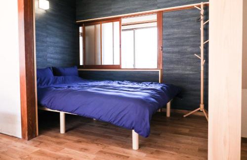 Ogishima Apartment | 鍬と本