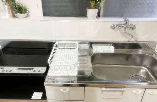 Nishi Apartment | 1 minute walk from the station in a good location! Accommodates 10 people! Rooftop BBQ available! Renovated! 3 bedrooms! 7 minutes to USJ! It takes 10 minutes to Namba by train! WIFI available