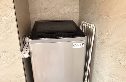 Wuqi District Apartment | 10 minutes to the Mitsui Shopping Park , 50 minutes to city center by Bus