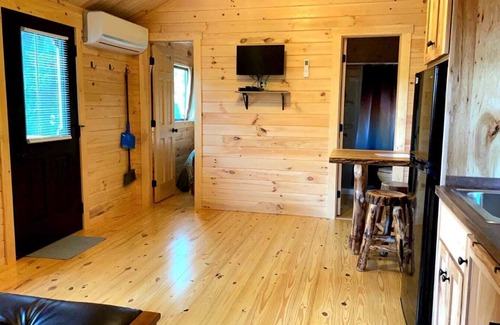 Logan Cabin | 114) Pelican Log Cabin. Close to Hocking Hills State Park and more!
