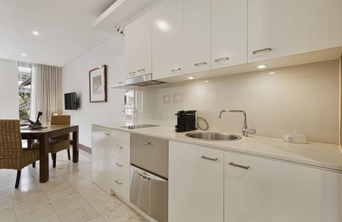 Casuarina Apartment | 119 Santai Resort - Poolside Apartment by uHoliday
