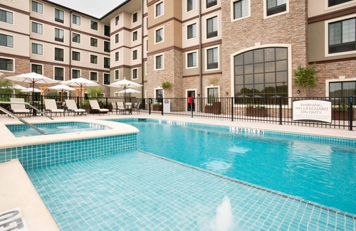 Hollywood Park Apartment | 15 Minutes from Six Flags! | Studio with Roll-in Shower + Outdoor Pool and Hot Tub