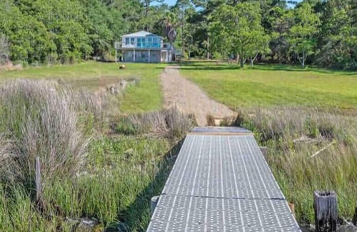 Gulf Shores House | 150’ Waterfront on Oyster Bay - Boater’s paradise