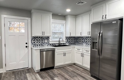Muskogee House | 1940's remodeled bungalow in quiet neighborhood.