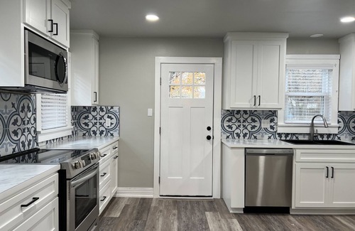Muskogee House | 1940's remodeled bungalow in quiet neighborhood.