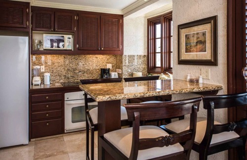 Diamond Valley Resort | 1BR/2BA Suite - Kitchen, Living Room & Balcony - Private Resort on Crane Beach!n