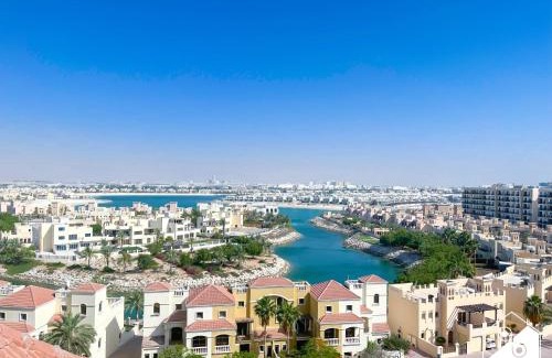 Al Hamra Village Apartment | 1BR Apartment in RAK with Lagoon View Balcony