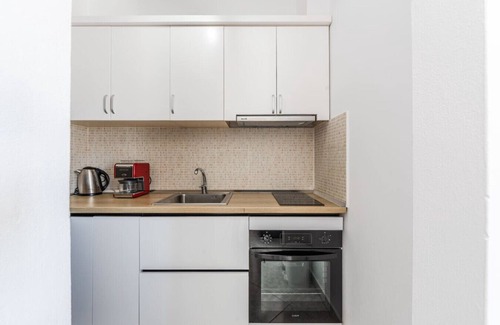 Golem Apartment | 1BR Apartment with Tree Views | Golem