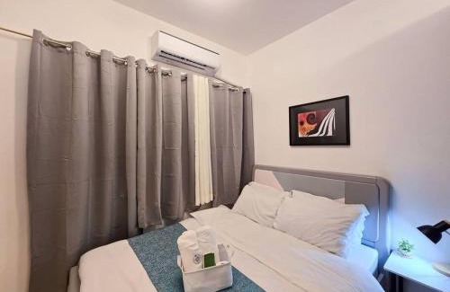 Highway Hills Apartment | 1BR Condotel with Balcony at FAME Residences #FM23
