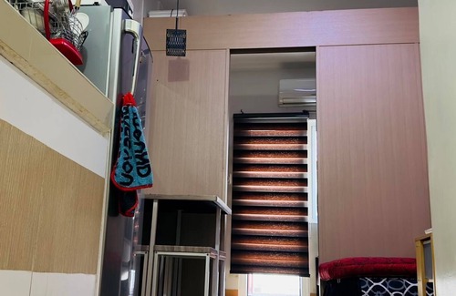 Novaliches Condo | 1BR with Balcony facing swimming pool (WIFI and Netflix)