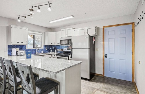 Village of Four Seasons Condo | 1st-floor condo with lake-view deck + on-site pools & hot tub
