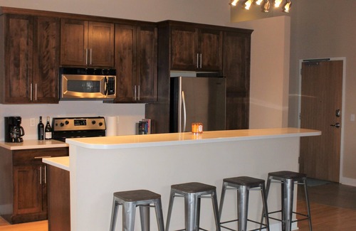 Grand Haven Condo | 2 BD/2BA Modern Condo in the Historic Downtown Armory