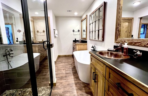 Graford House | 2 bed, 2 bath barndominium with pickle ball court, patio, & dock