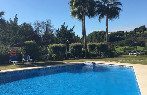 Benahavis Apartment | 2 bedroom 2 bath apartment on the first golf course on the first floor.