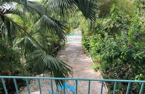 Culebra Pueblo Apartment | 2-bedroom apartment in Culebra, wrap around porch and roof deck with ocean view!