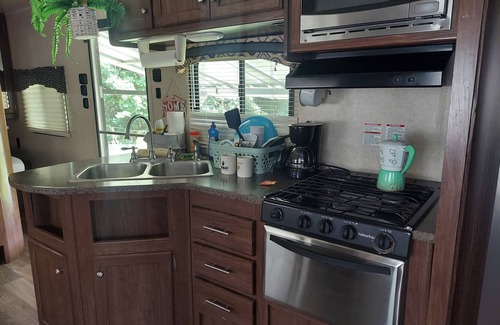 Aguadilla House | 2 bedroom camper, minutes from Aguadilla & Isabela beaches with AC and comfort.