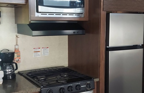 Aguadilla House | 2 bedroom camper, minutes from Aguadilla & Isabela beaches with AC and comfort.
