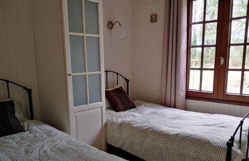 Aubigne-Racan Ski Chalet | 2 bedroom Chalet set in 3 1/2 acres overlooking a tranquil ornamental lake