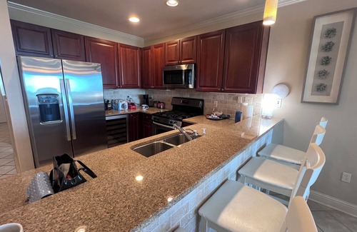 Orange Beach Condo | 2 BR at The Wharf Orange Beach pool/lazy river/gym/movie theatre/shops & more!