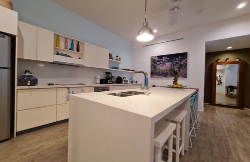 Crucecita Condo | 2 BR Patio Oasis Steps from Beach & Supermarket