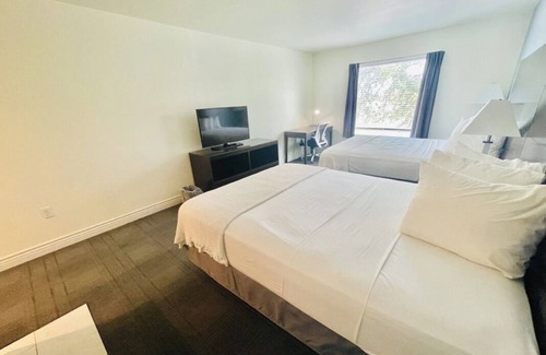 Cuero House | 2 Double Queen Rooms at FairBridge Inn & Suites Cuero, Pets Are Welcome!