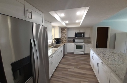 Brandon House | 2 houses 5bed 4bath heated pool prime location