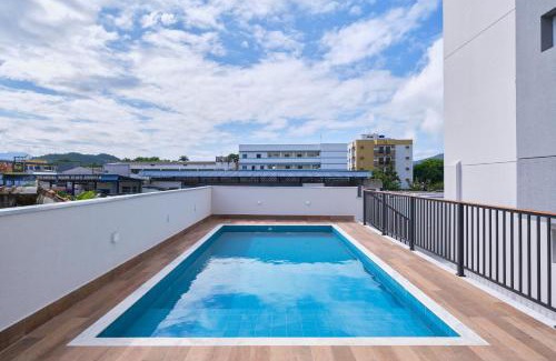Centro Apartment | 2 QUARTOS com Churrasqueira na Varanda, Piscina, Garagem interna, WiFi 500mbps, Ar Condicionado e Telas de Proteção