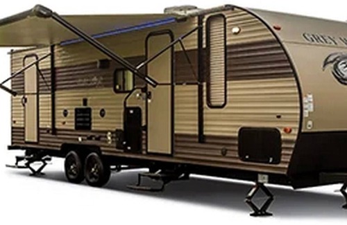 Lewiston House | 29' Deluxe Climate Controlled Toy Hauler Camper - Sleeps 4 Guests.