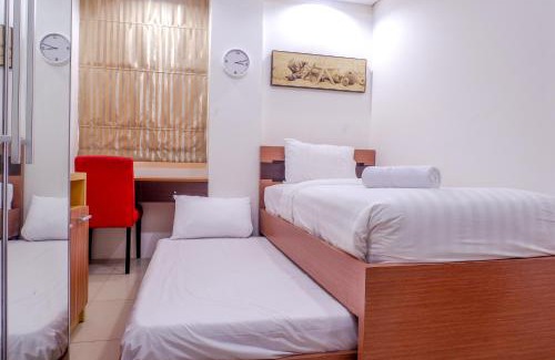 Bangka Apartment | 2BR Apartment Cozy Pool View Kemang Village with Access to Mall By Travelio