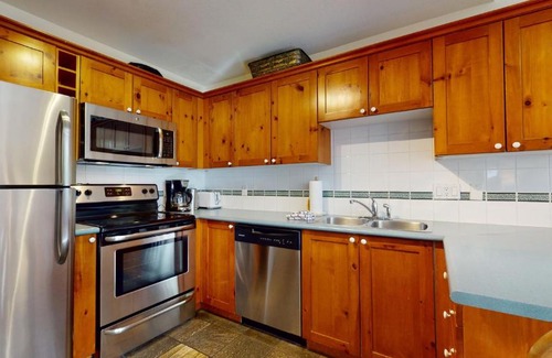 Village North House | 2BR in Symphony close to Whistler Village with Complex Hot Tub and Gas Fireplace