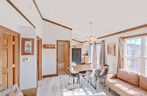 Indian Point Condo | 2BR Waterfront Duplex Cabin w/Pool + Swim & Boat dock