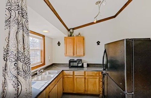 Indian Point Condo | 2BR Waterfront Duplex Cabin w/Pool + Swim & Boat dock