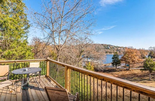 Indian Point Condo | 2BR Waterfront Duplex Cabin w/Pool + Swim & Boat dock