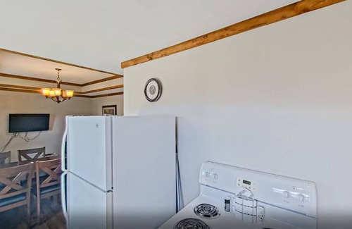 Indian Point Condo | 2BR Waterfront Duplex Cabin w/Pool + Swim & Boat dock