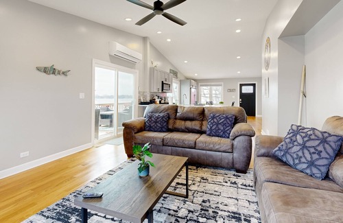 Channel Lake Apartment | 2nd-floor lakefront walk-up with firepit