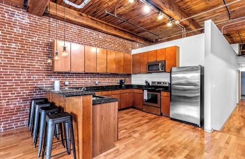 Downtown West Apartment | 3 Bed DWTN Loft-Theater Seating & 100" Projector-W/D