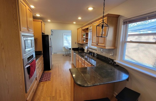 Skokie House | 3 Bedroom, 1.5 Bath in The Heart Of Skokie, 4 Seasons Porch and Pet-Friendly