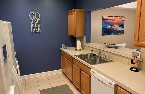 Ludington Condo | 3 Bedroom, 2 Bath Ground Level Condo with Walkout Access to Pool & Courtyard!